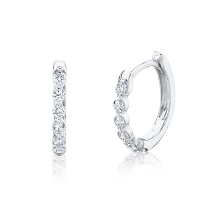 Women's platinum earrings-Shy Creation .26CTW Diamond Oval Huggie Earrings in 14K White Gold