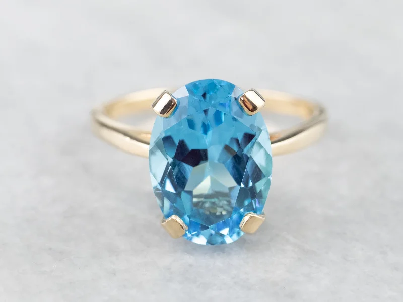 Women's ethical rings-Yellow Gold Blue Topaz Cocktail Ring