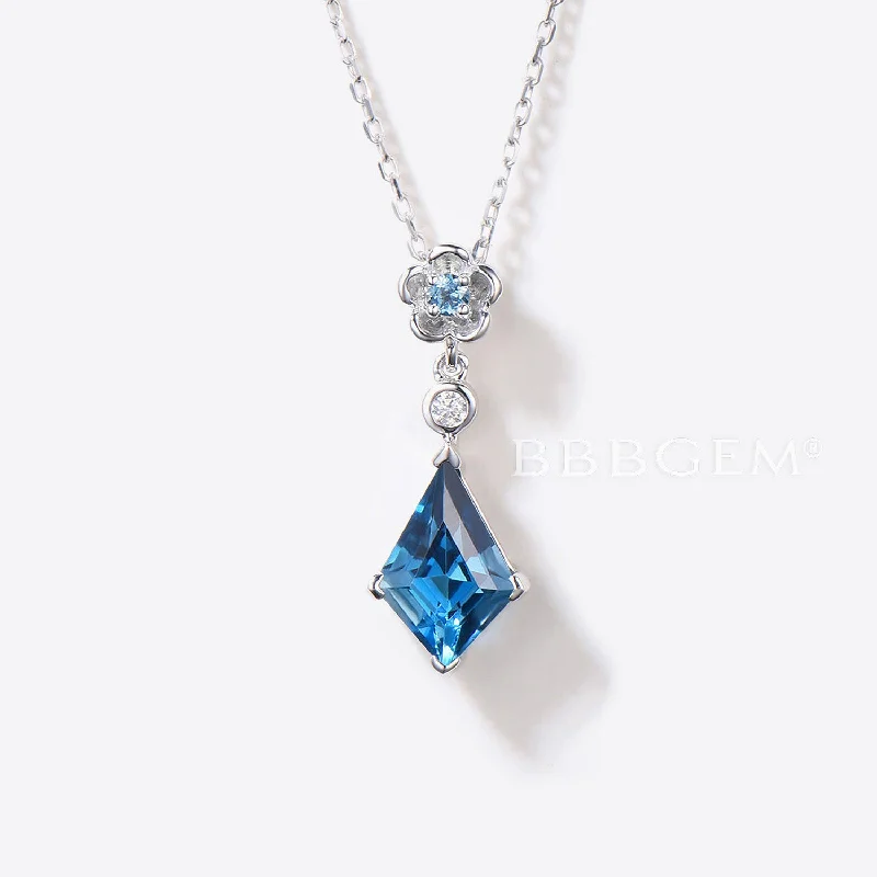 Women's limited edition necklaces-Kite Cut London Blue Topaz Wedding Necklace Silver Floral Pendant