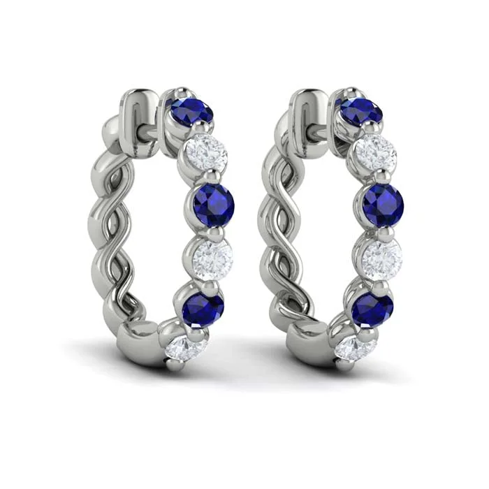 Women's fashion earrings-Vlora Diamond and Blue Sapphire Twist Hoop Huggie Earrings in 14K White Gold