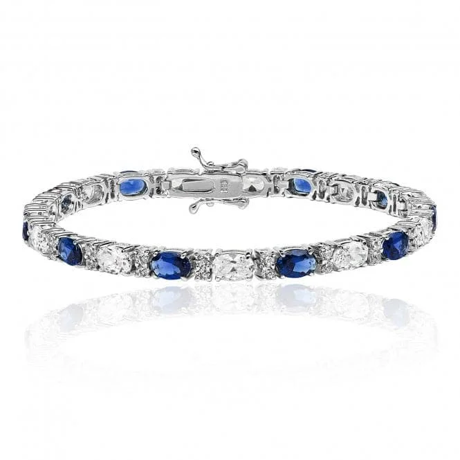 Women's travel bangles-Silver & Co Oval Sapphire Cubic Zirconia Bracelet with Secure Claw Setting SBG0034SA